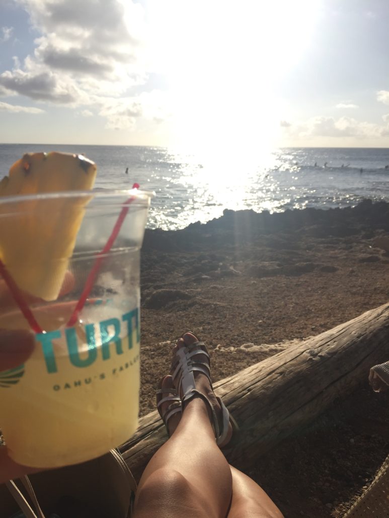 Drinks with a view of surfers at The Point