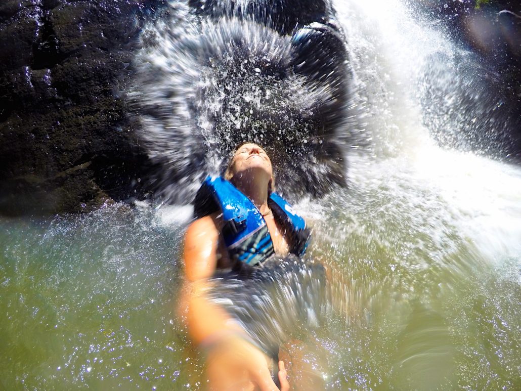 Under the Wahii waterfall